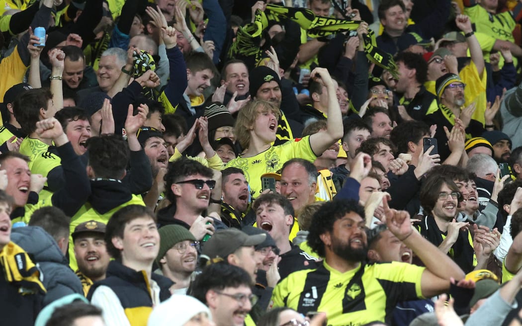 Fans celebrates a goal during the A-League Men’s Semi Final 1 (2nd leg) - Wellington Phoenix v Melbourne  Victory FC at Sky Stadium, Wellington on the 18th May 2024. © Copyright image by Marty Melville / www.photosport.nz