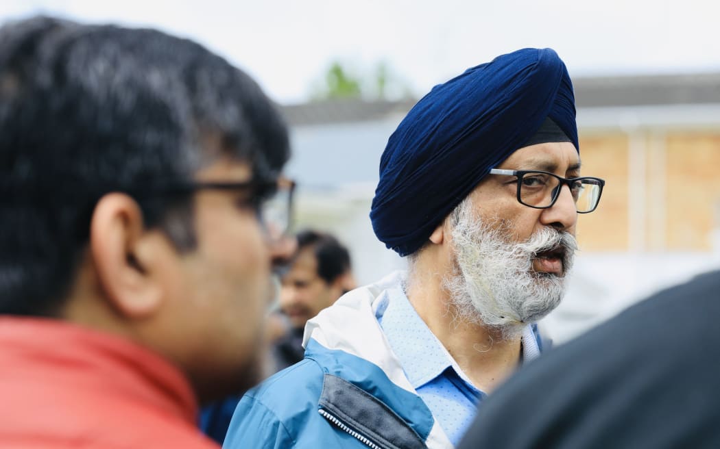 Community and media gather in aftermath of fatal dairy stabbing