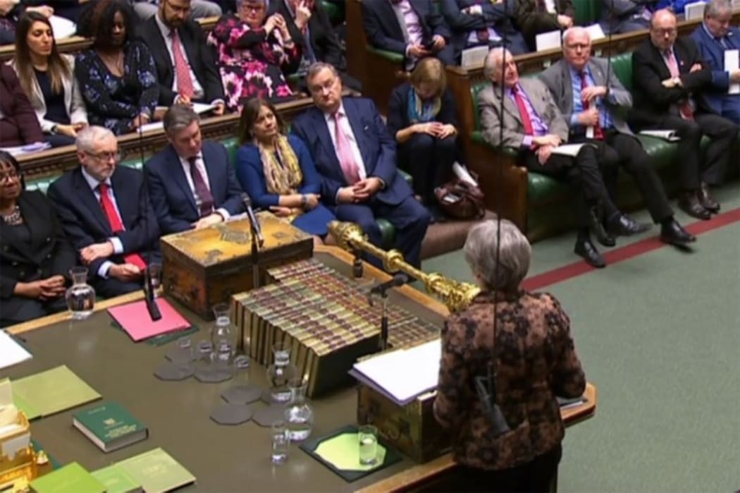 Britain's opposition Labour party leader Jeremy Corbyn listens as Prime Minister Theresa May makes a statement to the House of Commons in London on January 21, 2019, on changes to her Brexit withdrawal agreement.