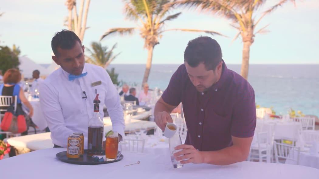 Nespresso ambassador Sam Wallace tips the sponsor's product into his cocktail in a scene cut from his report for TVNZ's Seven Sharp.