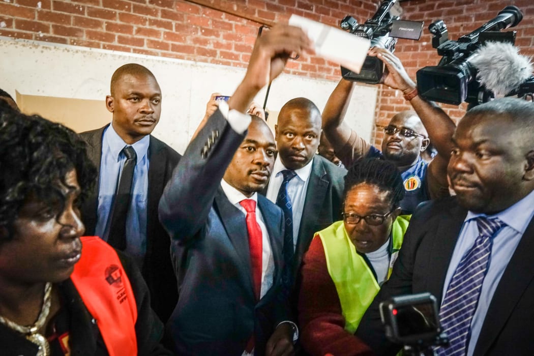 Zimbabwe's opposition leader Nelson Chamisa casts his vote.