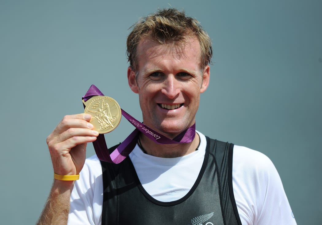 Mahé Drysdale showing off his medal after winning gold at the London Olympics in 2012.