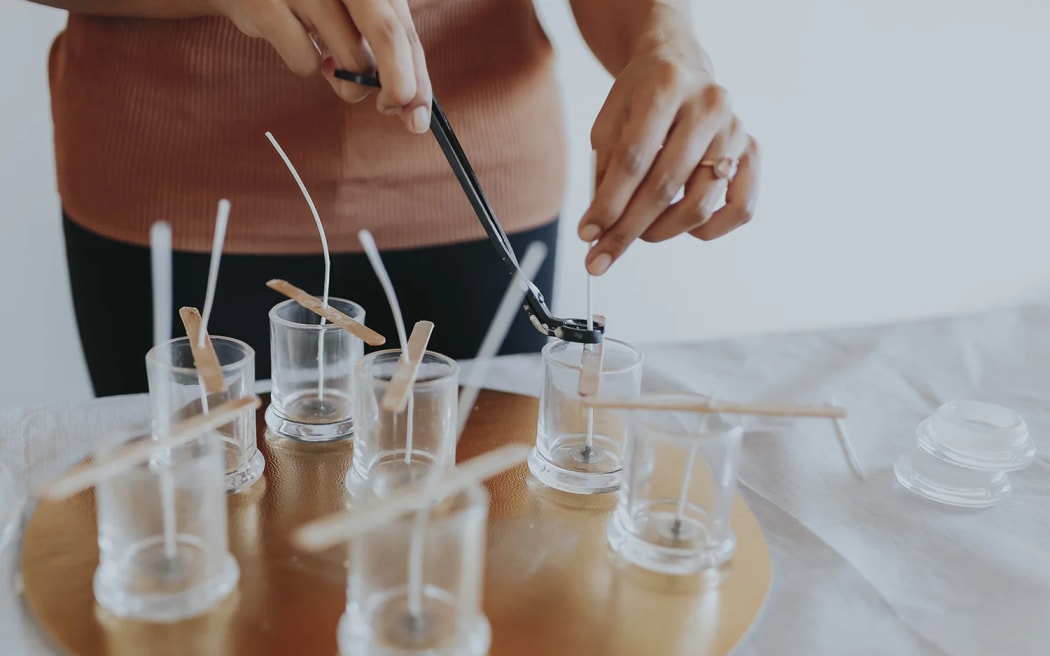 Auckland candlemaker Haya Khan at work