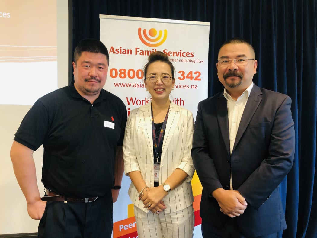 Bo Ning (left) and Kelly Feng from Asian Family Services and Dr Andrew Zhu (right) of Trace Research.