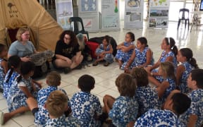 Otago Museum staff share their climate change message with children in the Cook Islands.
