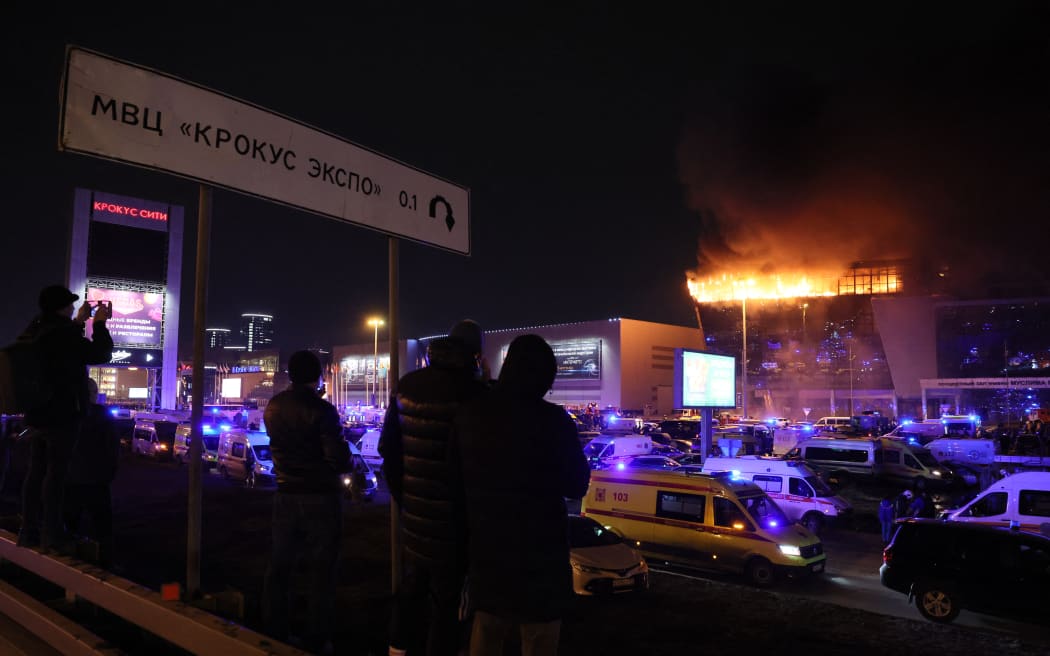 A view shows the burning Crocus City Hall concert hall following the shooting incident in Krasnogorsk, outside Moscow, on March 22, 2024.