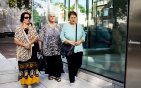 Members of a group of victims' relatives, "the Mothers of Srebrenica" arrive at Dutch supreme court to attend the ruling in the long-running case.