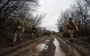 Ukrainian servicemen are seen along the frontline in Donbas, Ukraine on April 14, 2022.