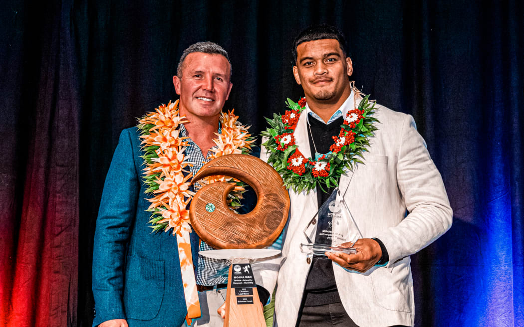 Solomone Funaki with his year end awards and outgoing coach Aaron Mauger