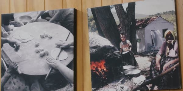 Photos of people making bread in Turkey on display at Zeki's Bakery, west Auckland.