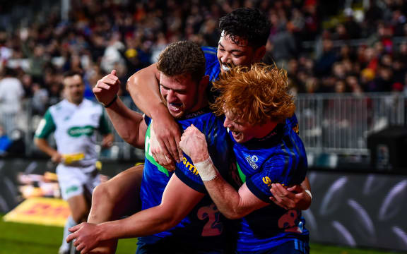 AJ Lam of the Blues and Finlay Christie of the Blues celebrates Dalton Papalii of the Blues try during the Super Rugby Pacific match, Crusaders Vs Blues, Christchurch 15 April.