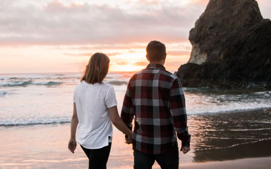 couple walking on the beach