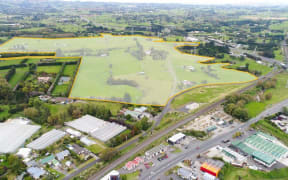 The land in East Drury Kiwi Property is planning to develop with a new town centre and residential development.