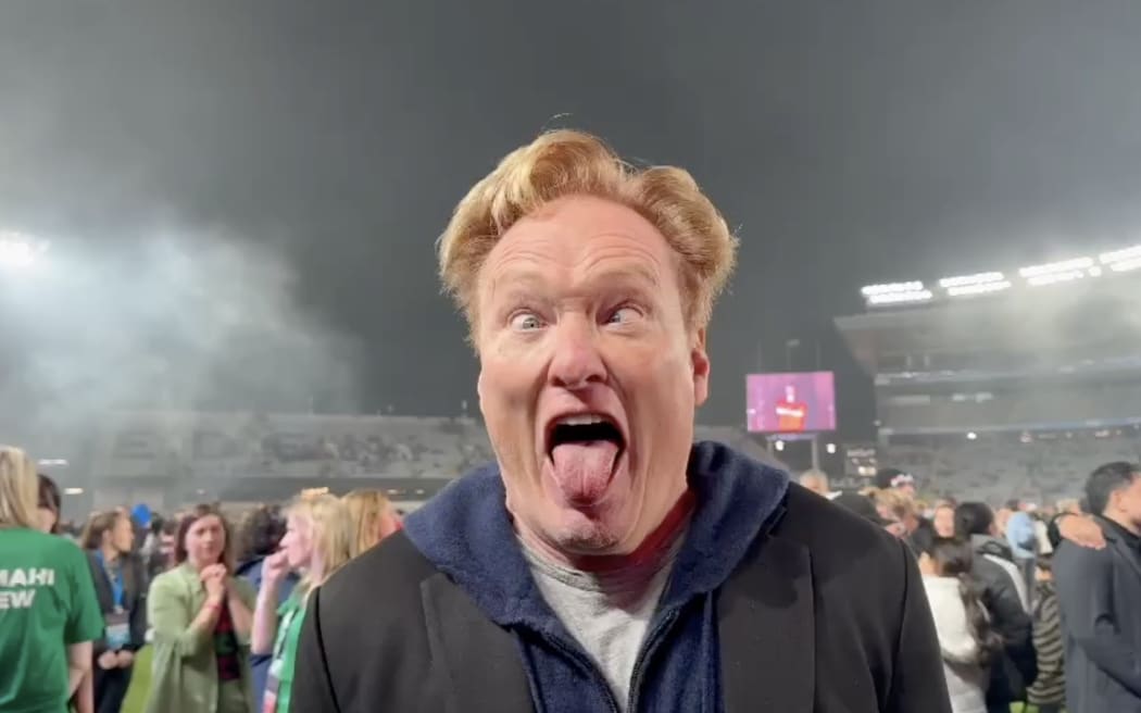 US celebrity Conan O'Brien shows off his pūkana at Eden Park.