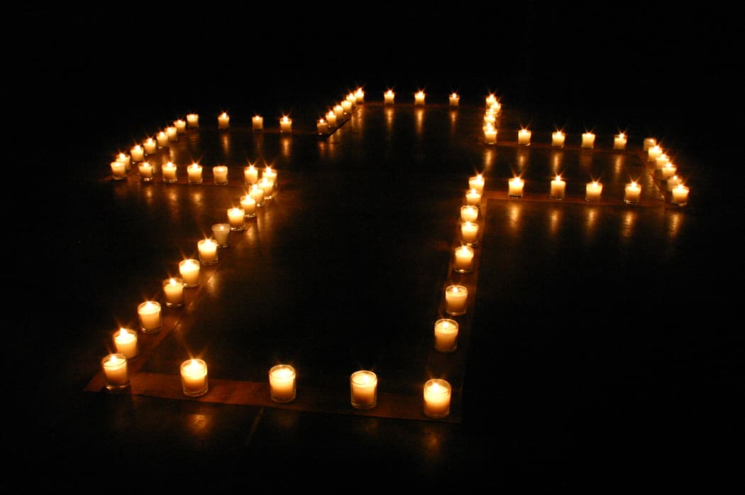 Cross of candles. arrangement made by Yun-Yu Hsieh and people from Austin Chinese Campus Christian Fellowship (ACCCF); at Gonzales, Texas, USA.