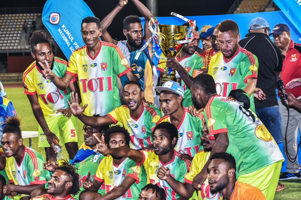 Toti City celebrate their fifth straight PNG National Soccer League title.
