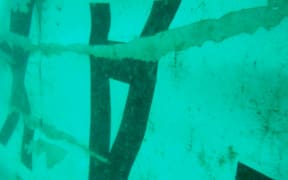 A handout image released by Indonesia's National Search And Rescue Agency (BASARNAS) on 7 January showing images believed to be of AirAsia QZ8501.