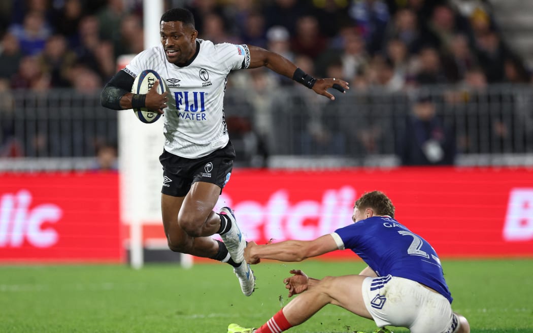 Fiji’s winger #11 Jiuta Wainiqolo (L) is tackled by France's centre #23 Emilien Gailleton during the Autumn Nations Series international rugby union test match between France and Fiji, at the Atlantic Stadium Bordeaux Metropole, in Bordeaux, south-western France on November 15, 2025. (Photo by ROMAIN PERROCHEAU / AFP)