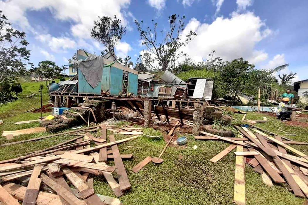 A photo taken on Saturday by the Red Cross of damage to a house on Vanua Levu, after the cyclone moved south.
