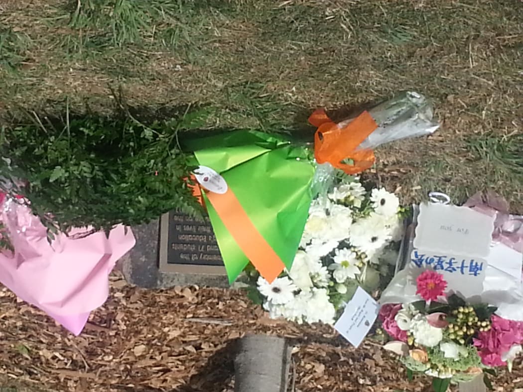 The memorial plaque at Latimer Square.