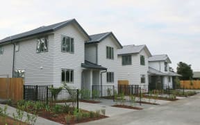 A row of 2 storey new buildings