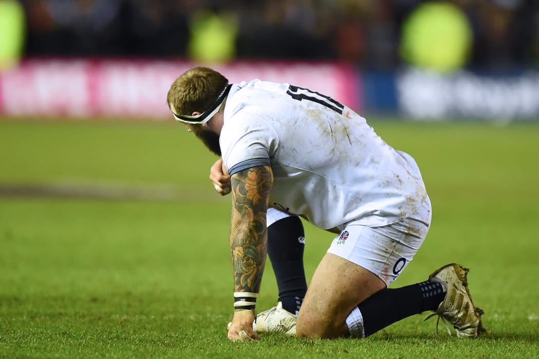 England's Joe Marler reacts on the final whistle in the Six Nations international rugby union match between Scotland and England at Murrayfield Stadium.