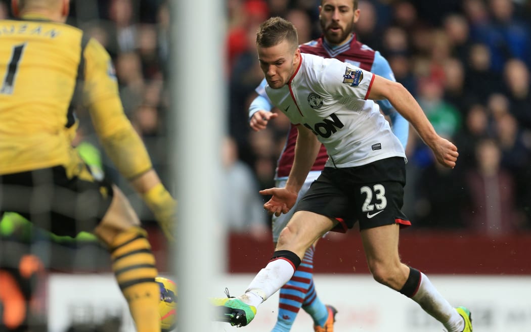 Manchester United's Tom Cleverley scores against Aston Villa.
