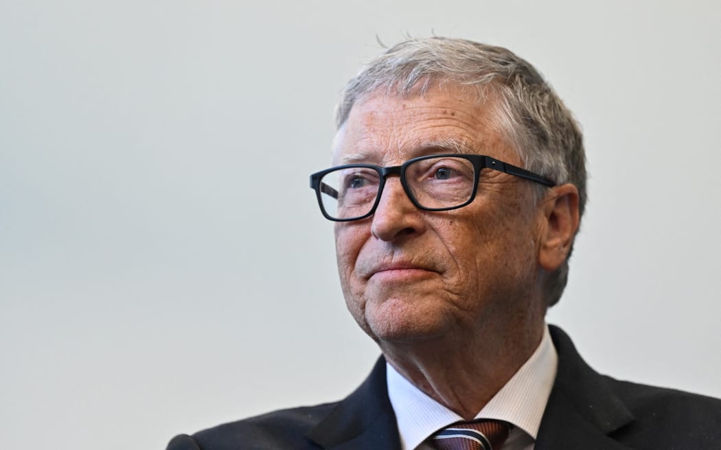 Microsoft founder Bill Gates reacts during a visit with Britain's Prime Minister Rishi Sunak of the Imperial College University, in central London, on February 15, 2023. (Photo by JUSTIN TALLIS / POOL / AFP)
