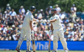 Will O'Rourke of the Black Caps and Daryl Mitchell of the Black Caps on the fourth day of the first cricket test between New Zealand and England at Hagley Oval in Christchurch, New Zealand. Sunday, Dec. 1, 2024. © Copyright photo: John Davidson / www.photosport.nz