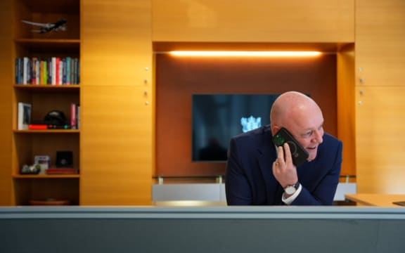 Prime Minister Christopher Luxon talking to US President-elect Donald Trump