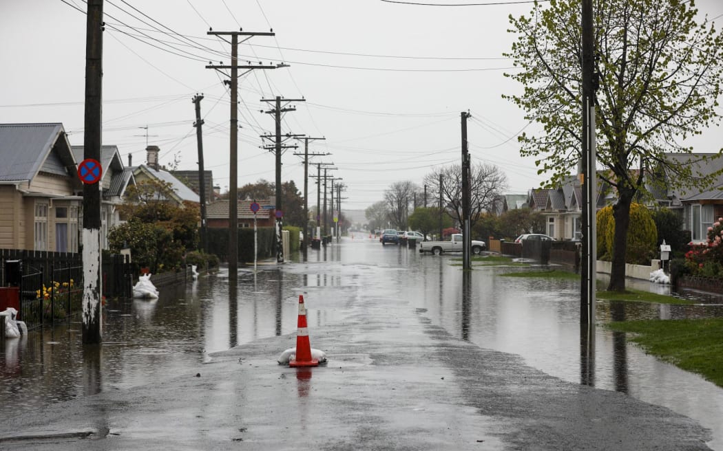Scenes on Surrey Street, South Dunedin, Friday evening.
