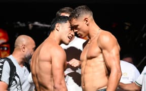 Jai Opetaia of Australia (left) faces off with David Nyika of New Zealand during their official weigh-in for the World Cruiserweight title fight at the Gold Coast Convention & Exhibition Centre in Gold Coast, Tuesday, January 7, 2025. (AAP Image/Dave Hunt/www.photosport.nz) NO ARCHIVING