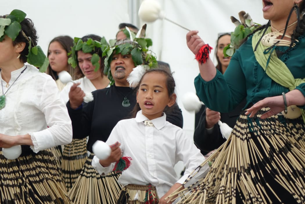 Nataria Winikerei, 7, as the story of Parihaka is performed at the Taranaki Treaty settlement yesterday.