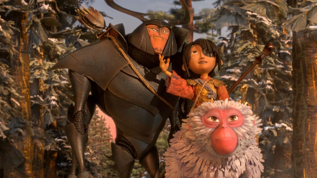 Bug (Matthew McConaughey), Kubo (Art Parkinson) and Monkey (Charlize Theron) on their quest in Kubo