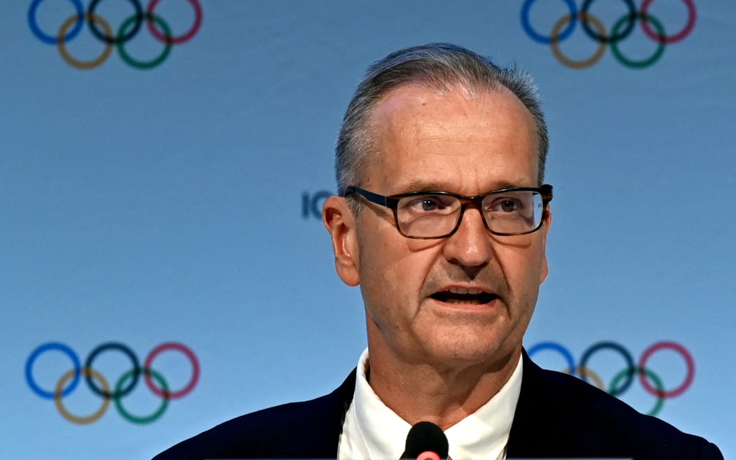 Director of Communications for International Olympic Committee (IOC) Mark Adams speaks during a press conference ahead of the upcoming 141st IOC session in Mumbai on October 12, 2023. The International Olympic Committee on October 12, suspended Russia's national Olympic body with "immediate effect" for violating the territorial integrity of Ukraine's membership. (Photo by Indranil MUKHERJEE / AFP)