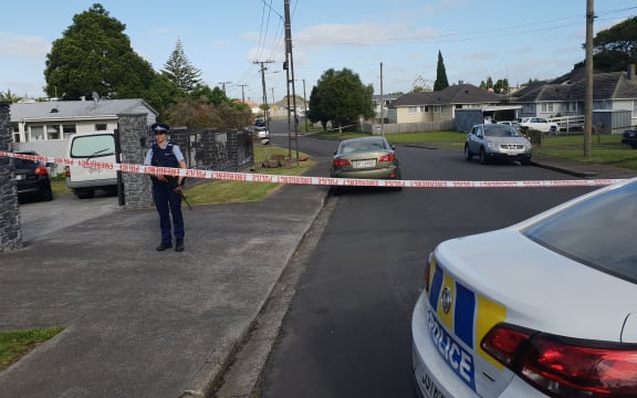 Armed police are protecting a large cordon in Mt Roskill where a person was stabbed and killed last night.