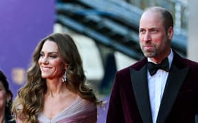 Britain's Catherine, Princess of Wales and Britain's Prince William, Prince of Wales, together with arrive with Jane Millichip, CEO of the British Academy of Film and Television Arts and Lord-Lieutenant of Greater London Ken Olisa arrive  at the BAFTA British Academy Film Awards at the Royal Festival Hall, Southbank Centre, in London, on February 22, 2026.