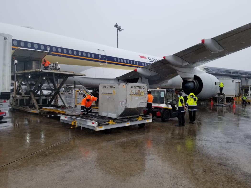 The first batch of the Pfizer Covid-19 vaccine is offloaded after arriving in New Zealand on 15 February