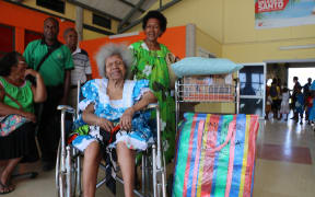 Clementine and her mother Lina (front) were airlifted from Ambae.