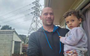 David Easton, with baby Mia, thinks he timed the purchase of his Tohora Place home perfectly.