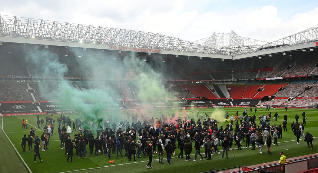 Supporters protest against Manchester United's owners, inside English Premier League club Manchester United's Old Trafford stadium in Manchester, north west England on May 2, 2021, ahead of their English Premier League fixture against Liverpool.