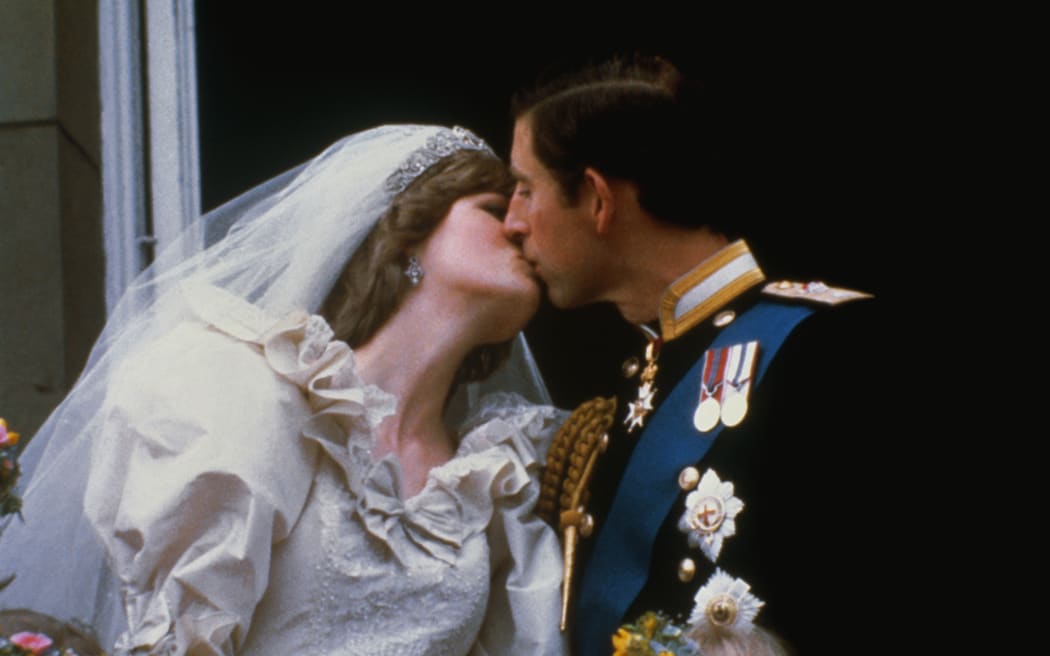 (Original Caption) Wedding of Prince Charles and Lady Diana Spencer. Shows the famous kiss on the balcony of Buckingham Palace, after ceremony.