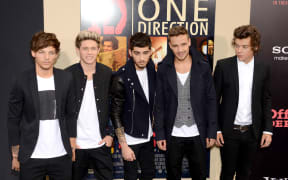 NEW YORK, NY - AUGUST 26: (L-R) Louis Tomlinson, Niall Horan, Zayn Malik, Liam Payne and Harry Styles attend the New York premiere of "One Direction: This Is Us" at the Ziegfeld Theater on August 26, 2013 in New York City.