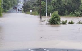 Flooding in Swanson, Auckland, from the Waimoko stream.