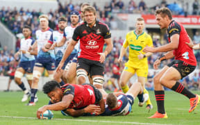 Leicester Fainga'anuku of the Crusaders scores a try which was later disallowed during the Super Rugby Pacific Round 10 match between the Crusaders and the Melbourne Rebels at AAMI Park in Melbourne, today.