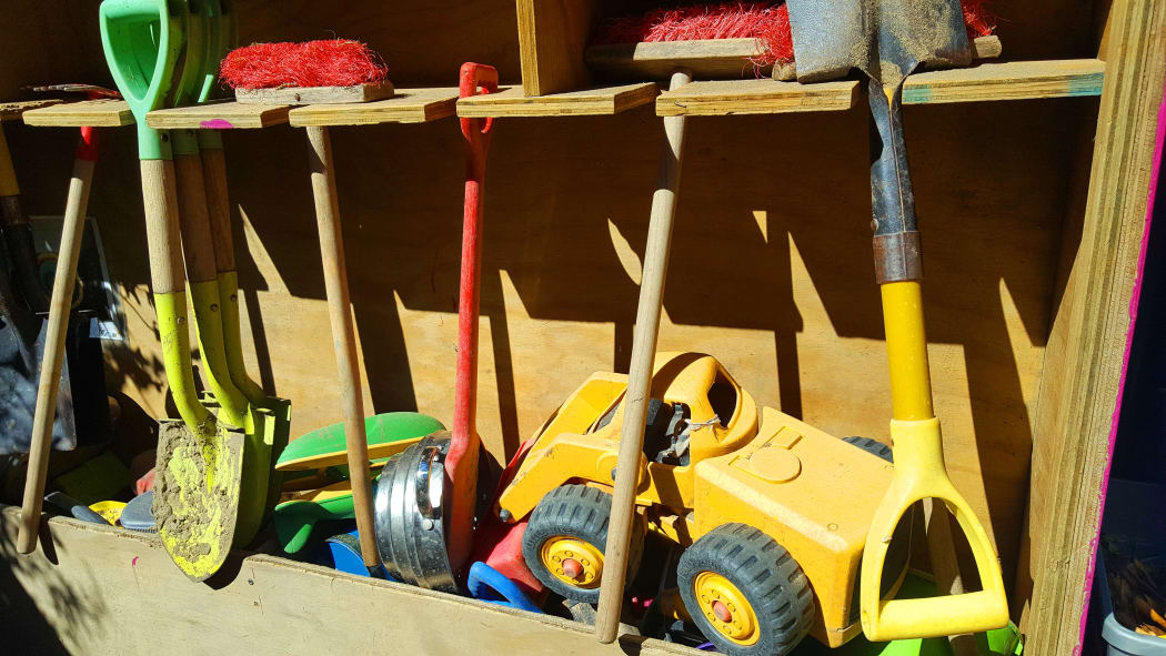 Spades at a kindergarten sandpit