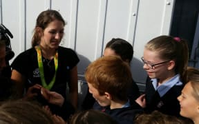 Olympic pole vaulter Eliza McCartney meets students from Belmont Intermediate.