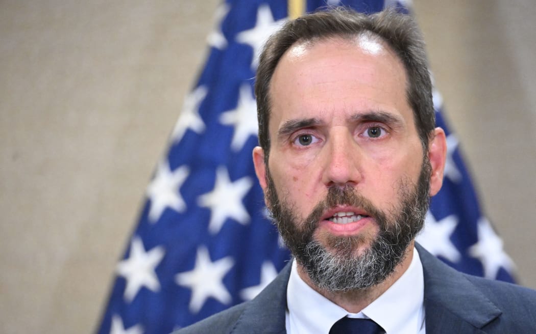 (FILES) Special Counsel Jack Smith speaks to the press at the US Department of Justice in Washington, DC, on June 9, 2023, announcing the unsealing of the indictment against former US President Donald Trump. Former US president Donald Trump faced fresh charges Juy 27, 2023 alleging that he attempted to obstruct the investigation into the mishandling of top-secret documents by conspiring to delete surveillance footage at his Mar-a-Lago property in Florida. (Photo by Mandel NGAN / AFP)