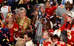 Kansas City Chiefs’ wide reciever #12 Mecole Hardman holds the trophy after winning Super Bowl LVIII against the San Francisco 49ers at Allegiant Stadium in Las Vegas, Nevada, February 11, 2024. (Photo by Patrick T. Fallon / AFP)