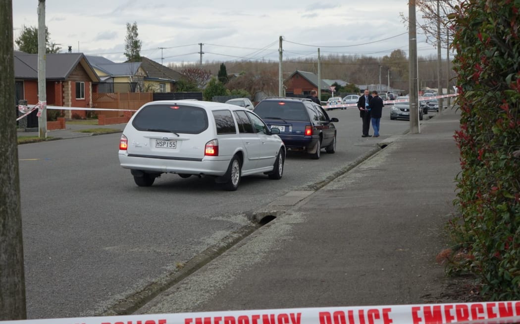 Hearses at the scene.